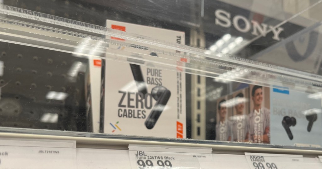 black earbuds on shelf