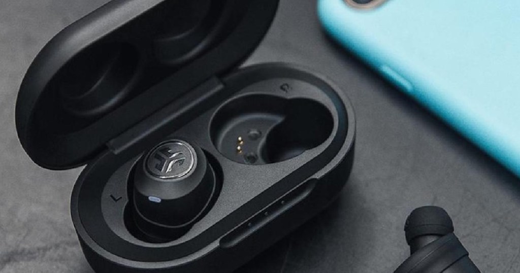 black earbuds next to turquoise phone 