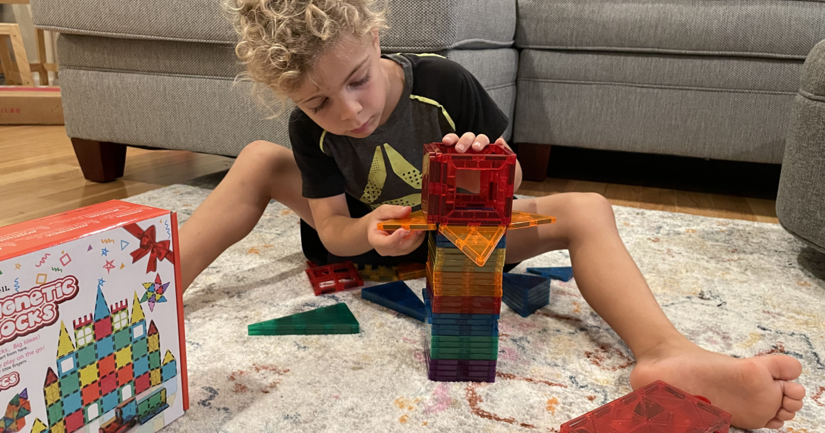 child playing with a Jasonwell Magnetic Blocks set]