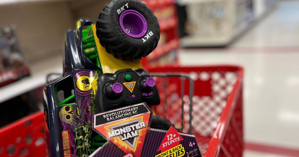 toy truck on side of red basket