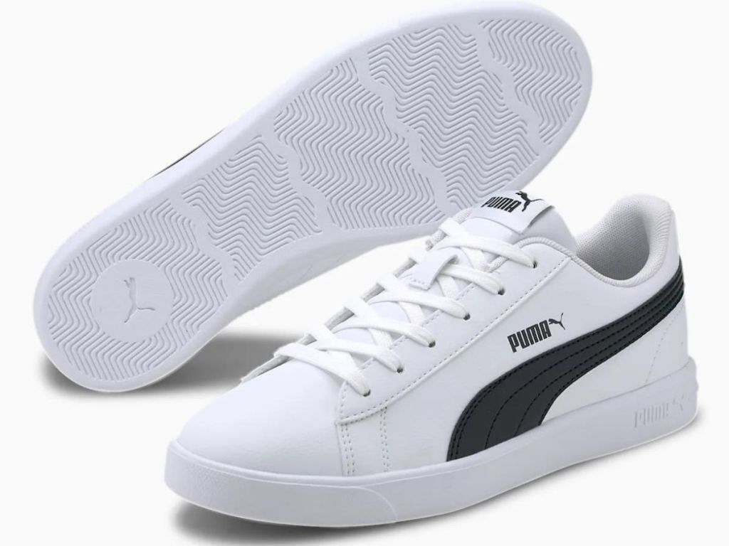 white and blue PUMA sneakers