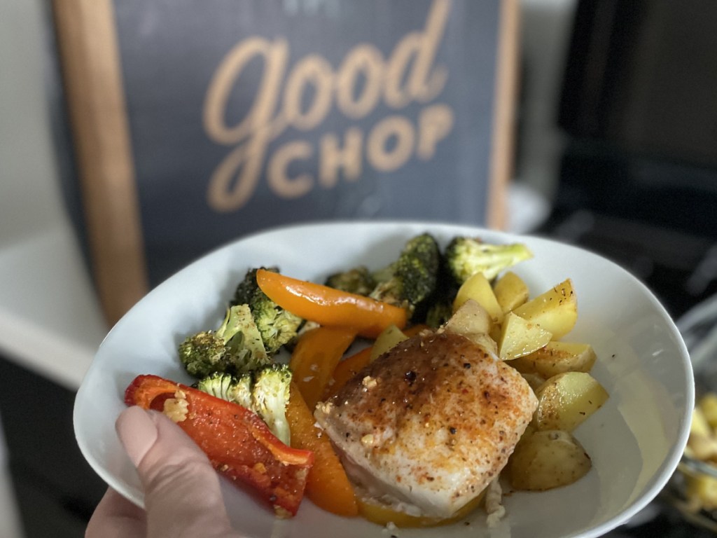 Plate of Food with Good Chop box in background