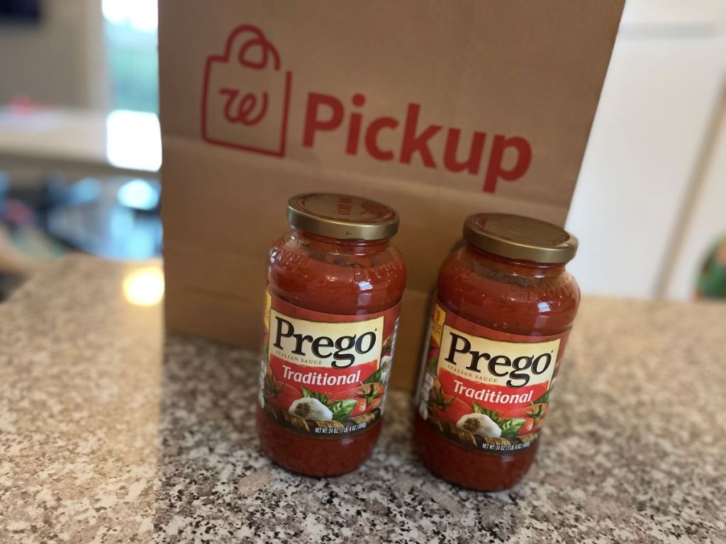 Prego Pasta sauce next to Walgreens Bag