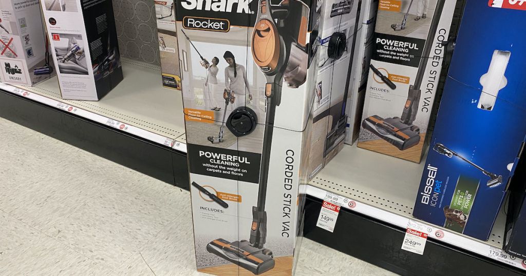 vacuum on floor in front of display 