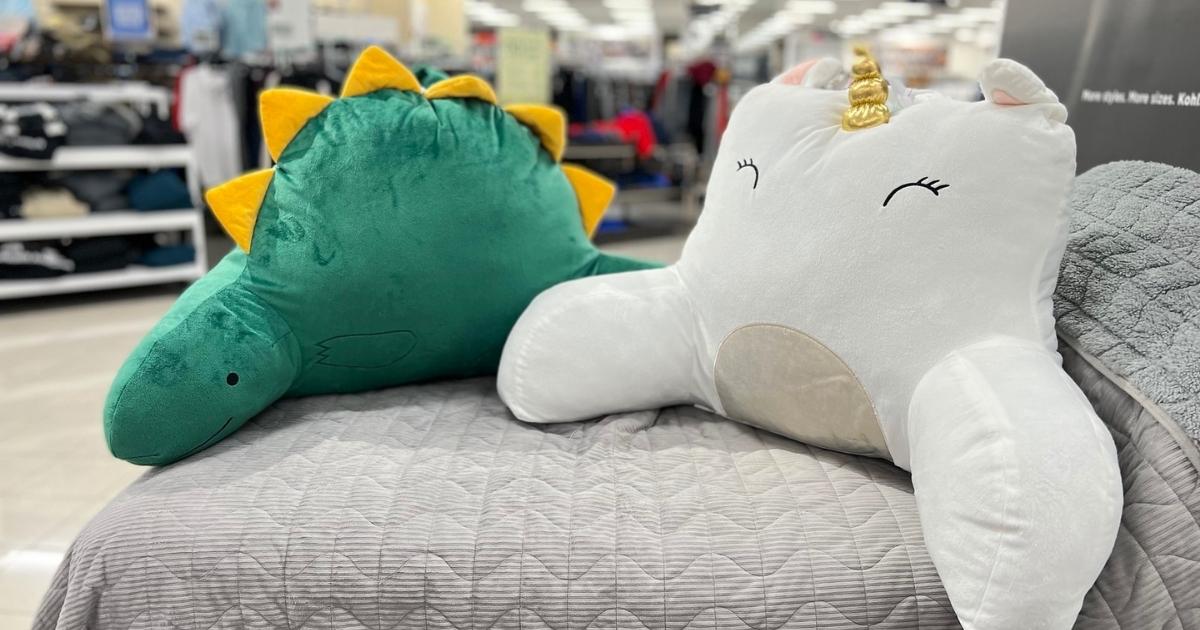 The Big One Back Rest Pillows in dinosaur and unicorn shapes