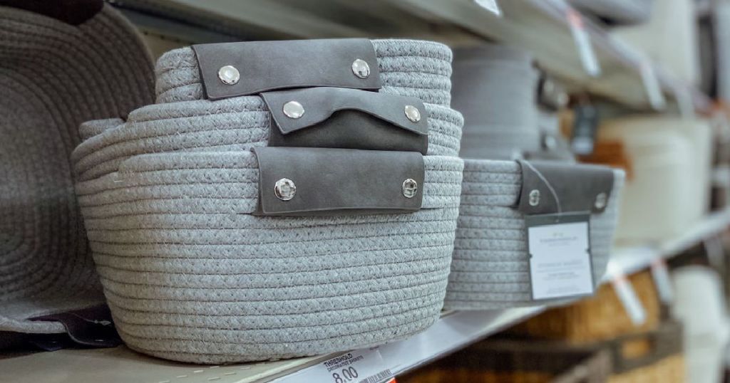 gray baskets on shelf