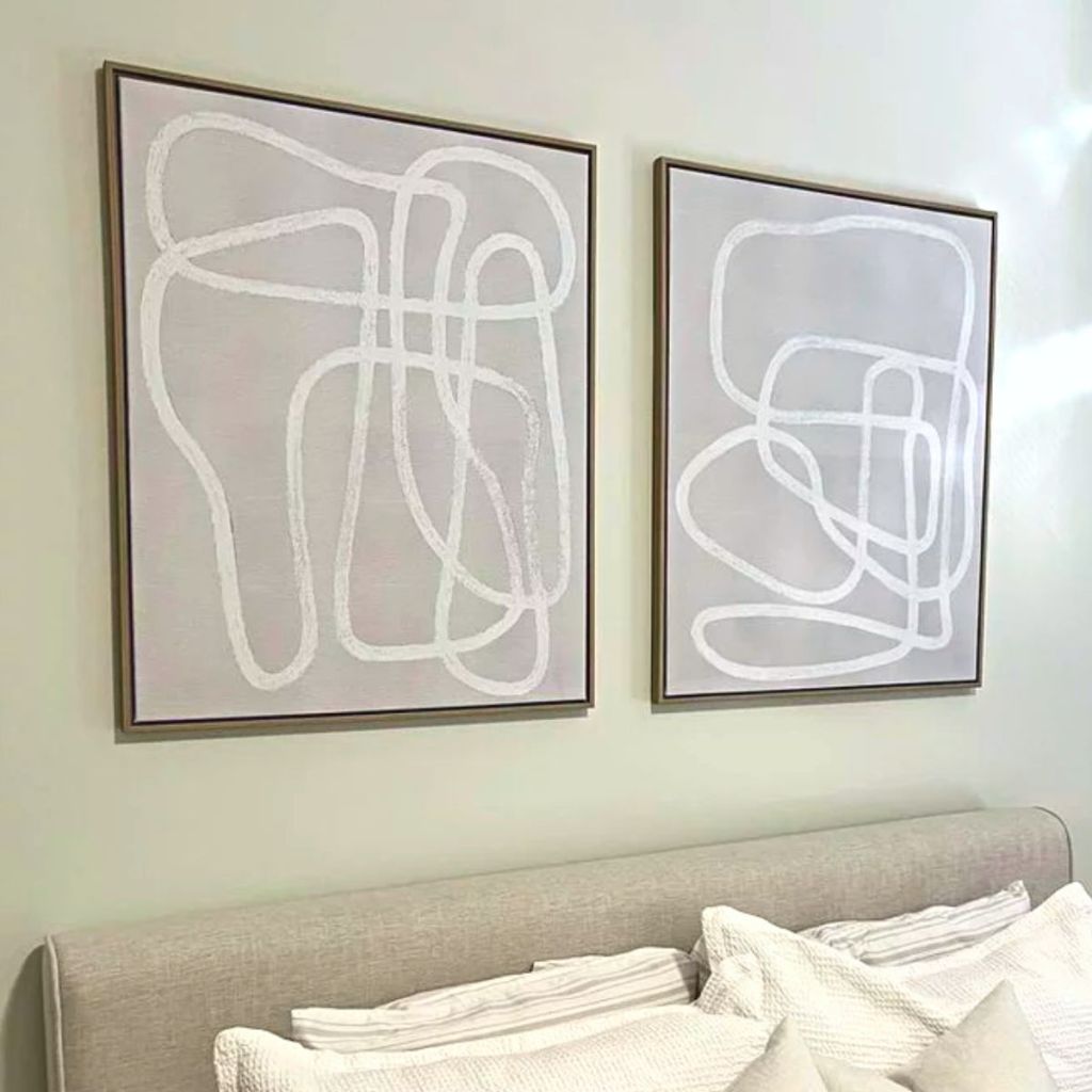 Threshold Line Drawing Wall Canvases hanging above a bed