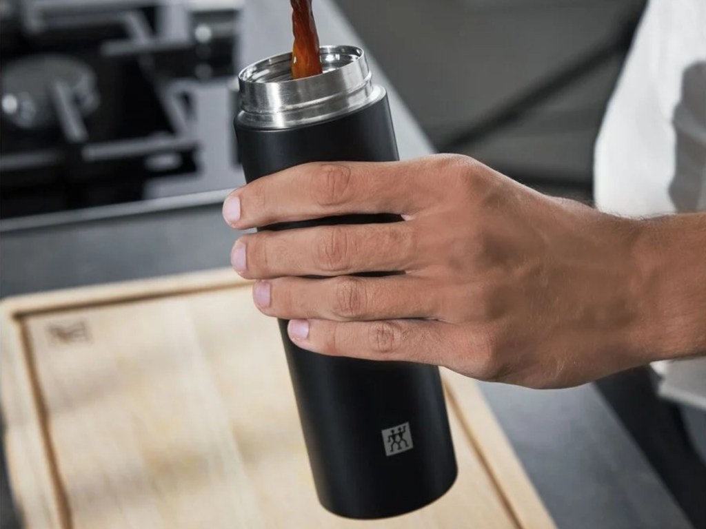 coffee being poured in zwilling thermo bottle