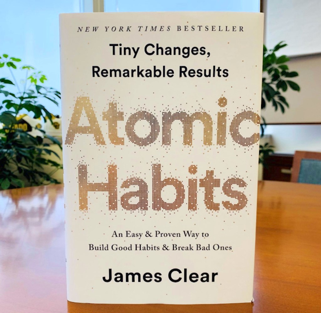 atomic habits book on table