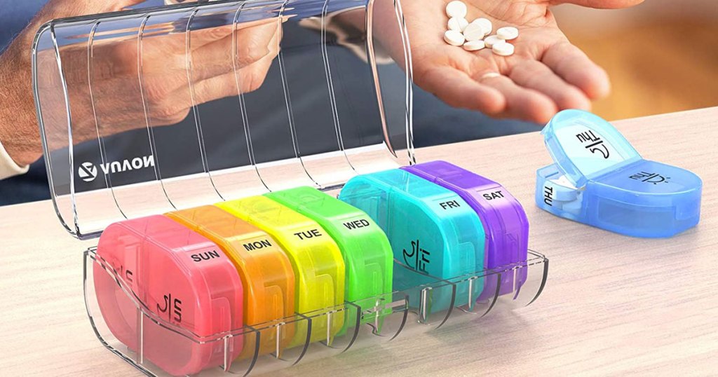 multicolor pill organizer containers