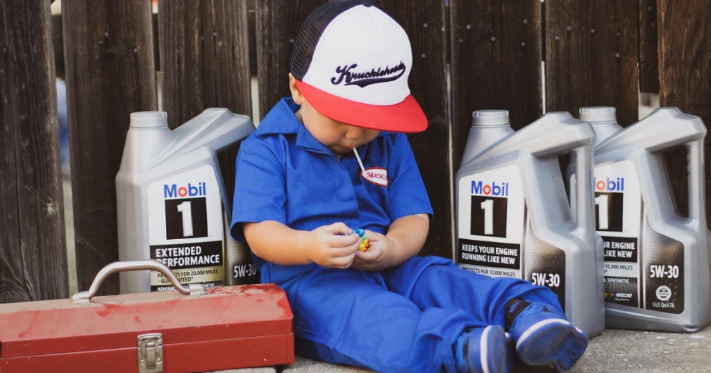 boy wearing Knuckleheads Kids Overalls in blue