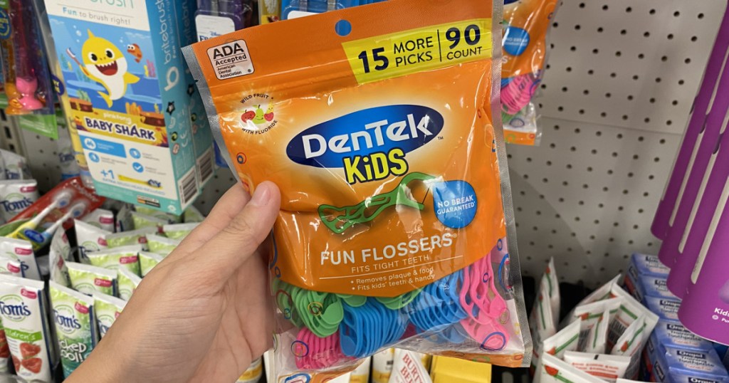 dentek kids flossers bag in-hand