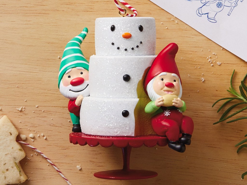 keepsake ornament featuring a snowman and 2 gnomes