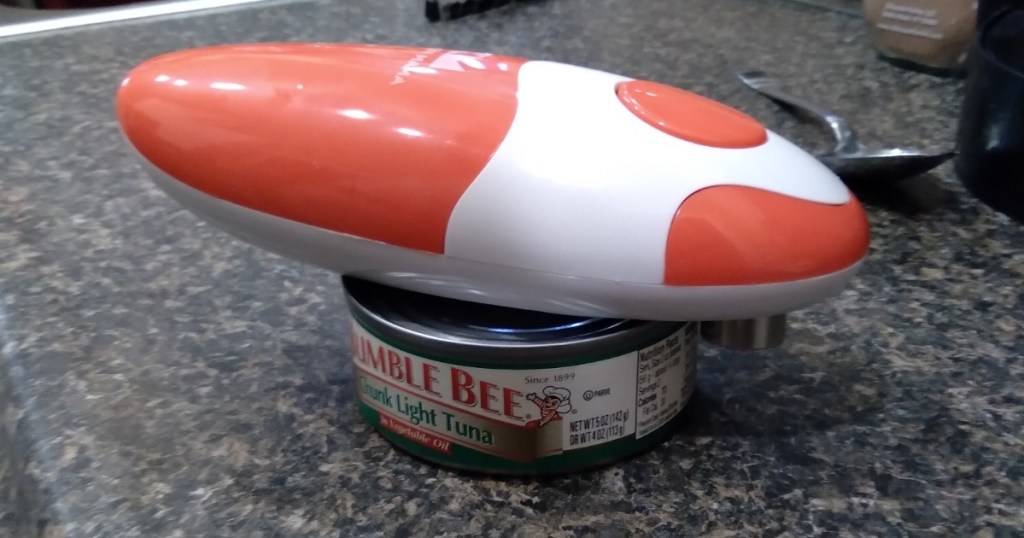 hands-free can opener on can of tuna
