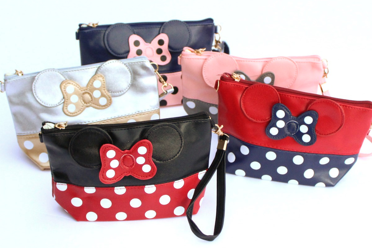 stock image of five cosmetics bags with minnie ears