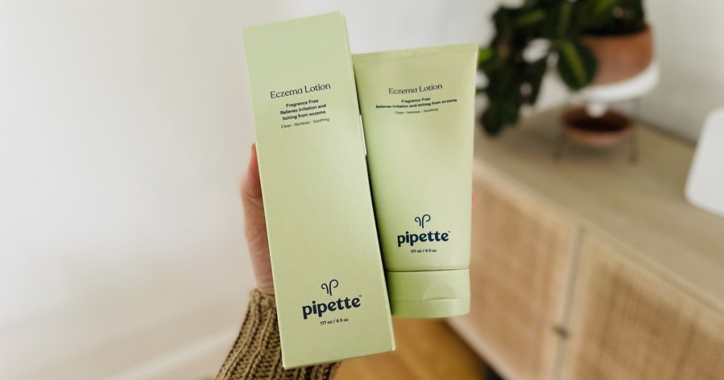 pipette eczema lotion and box in hand 