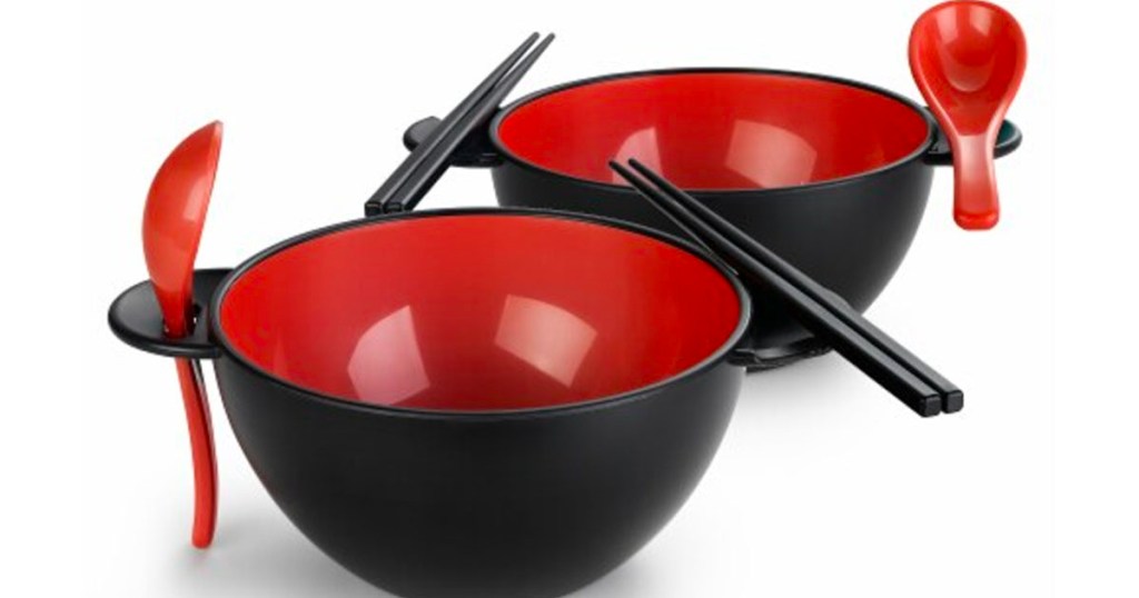 red and black ramen bowls with chopsticks and spoons
