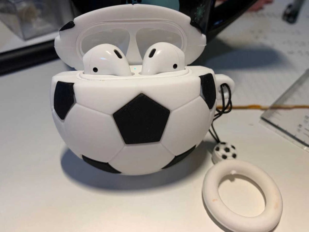 AirPods case shaped like a soccer ball