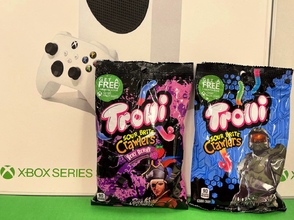 trolli sour crawlers in front of xbox display