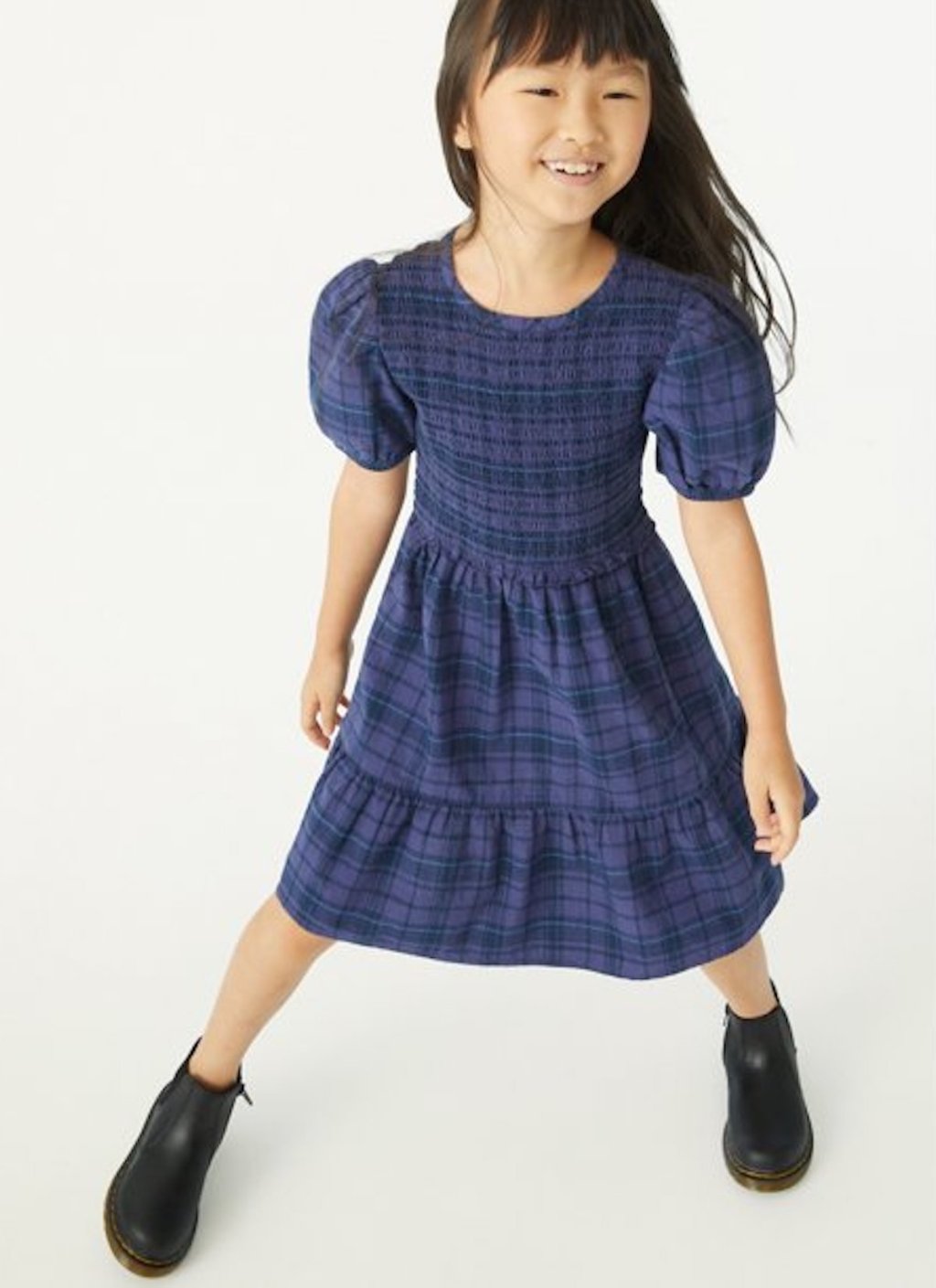 stock photo of girl wearing purple plaid dress