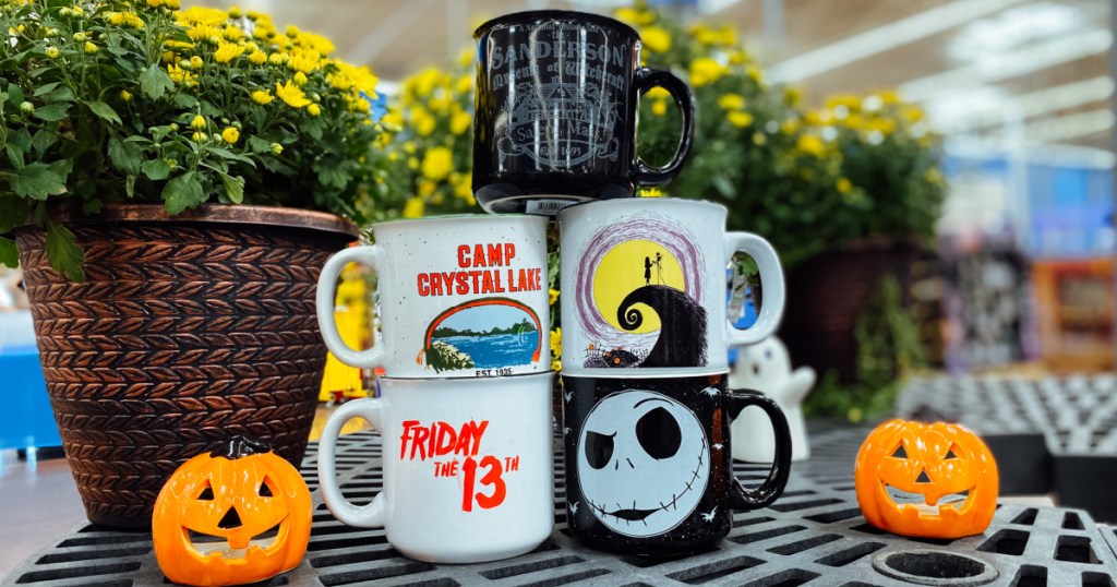 stack of movie-themed coffee mugs
