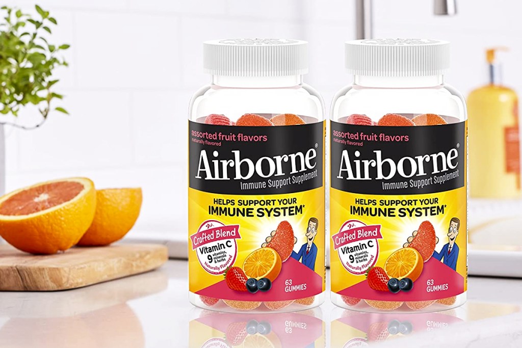 two bottles of Airborne Vitamin C Gummies on kitchen counter