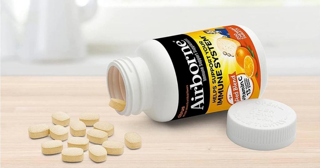 airborne vitamin c chewable tablets laid out on table