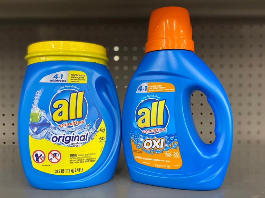 two bottles of All brand laundry detergent