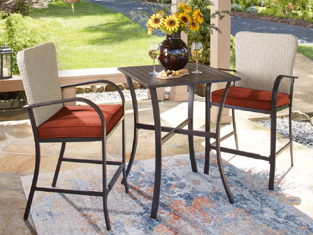 Ashleys furniture table and chairs outdoors