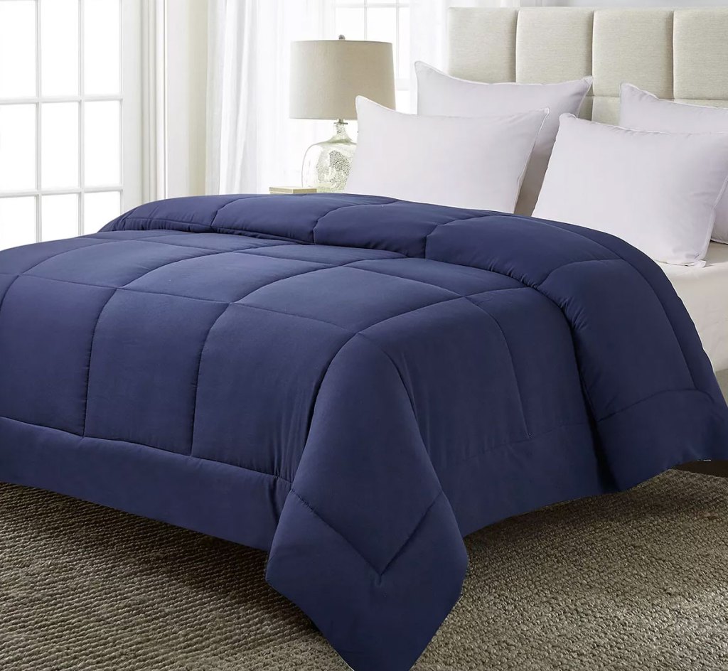 blue comforter on bed