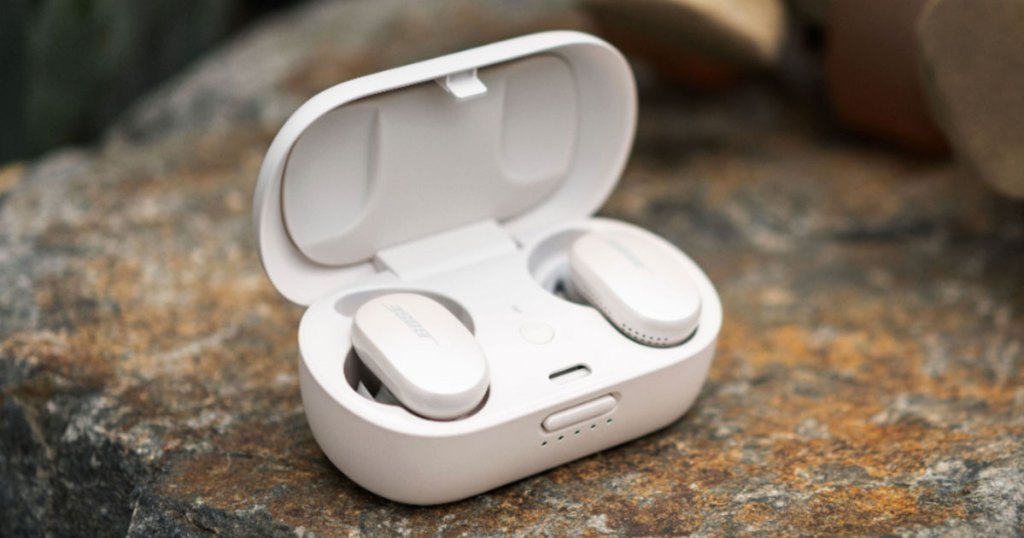 white earbuds in charging case