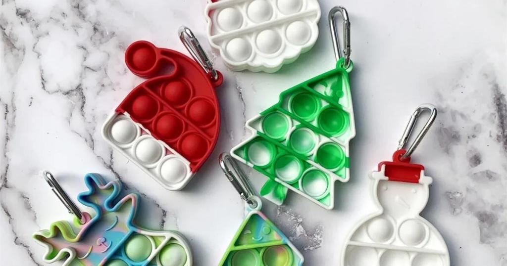 christmas pop it keychains in different shapes