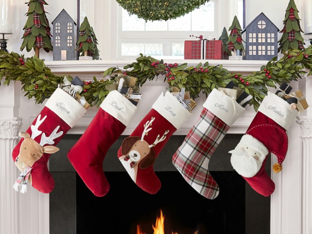 Classic Velvet Christmas Stockings hanging from mantel