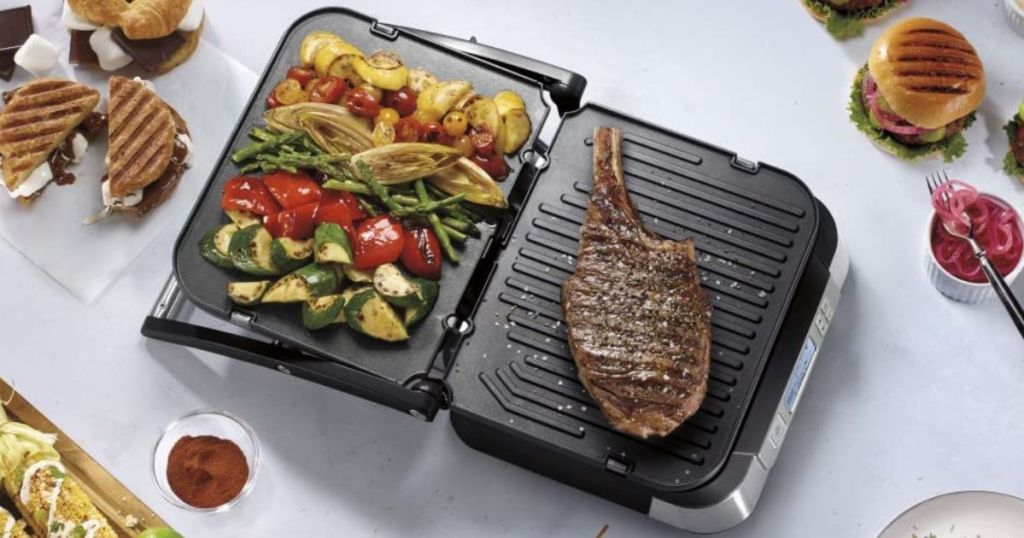 Cuisinart Smokeless Griddle (1) open with veggies on one side and steak on the other