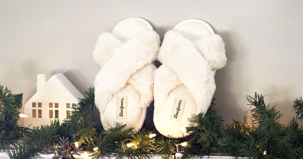 white slippers on mantel with garland