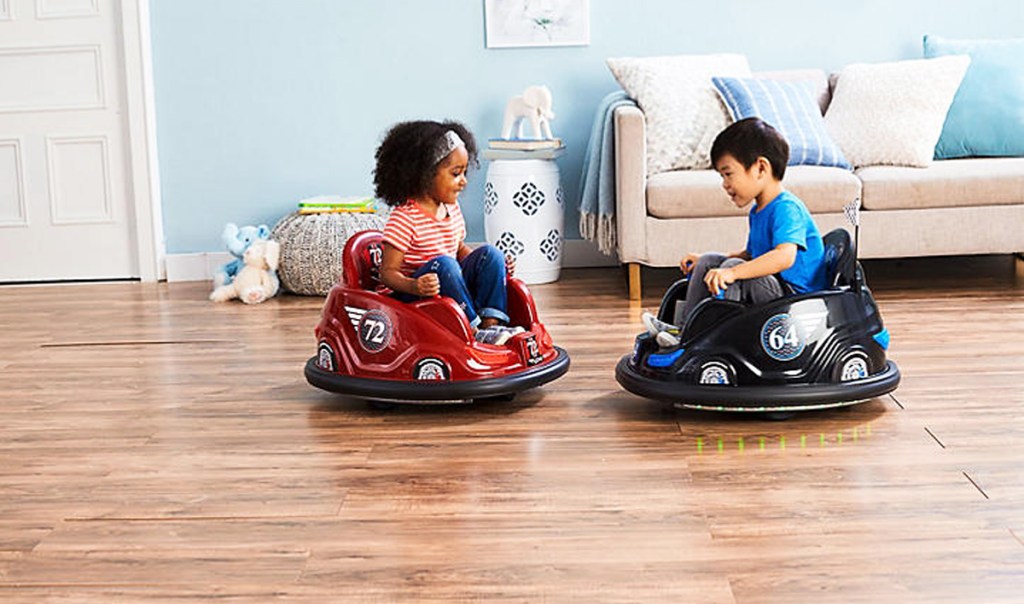 two kids in electric bumper cars