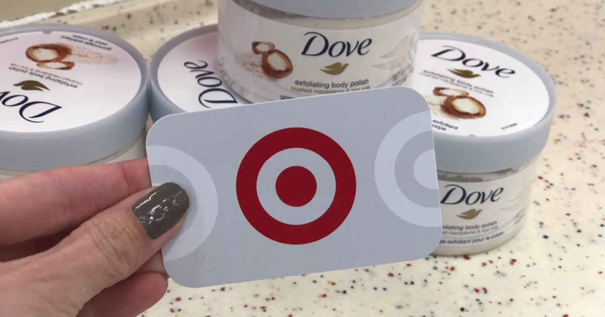 manicured hand holding Target gift card in front of Dove Polish