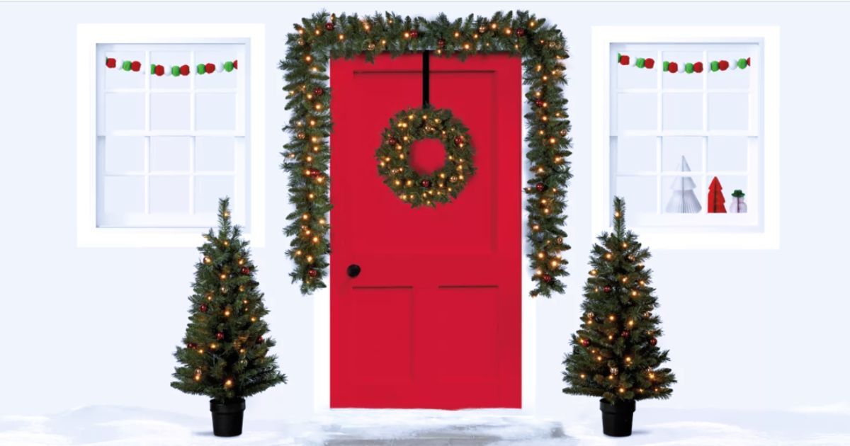 Outdoor Christmas decor on the front door of a house
