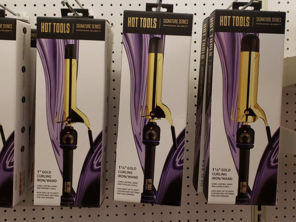 Store display with boxes of hair curling irons