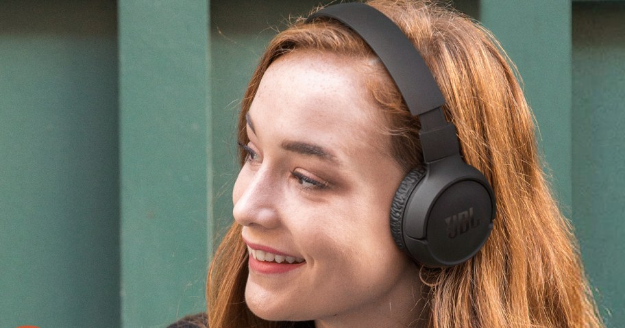 woman wearing black headphones