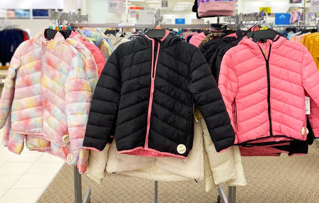 girls puffer jackets on store display
