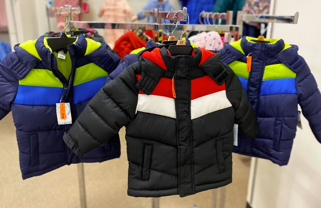 toddler puffer jackets on display in store