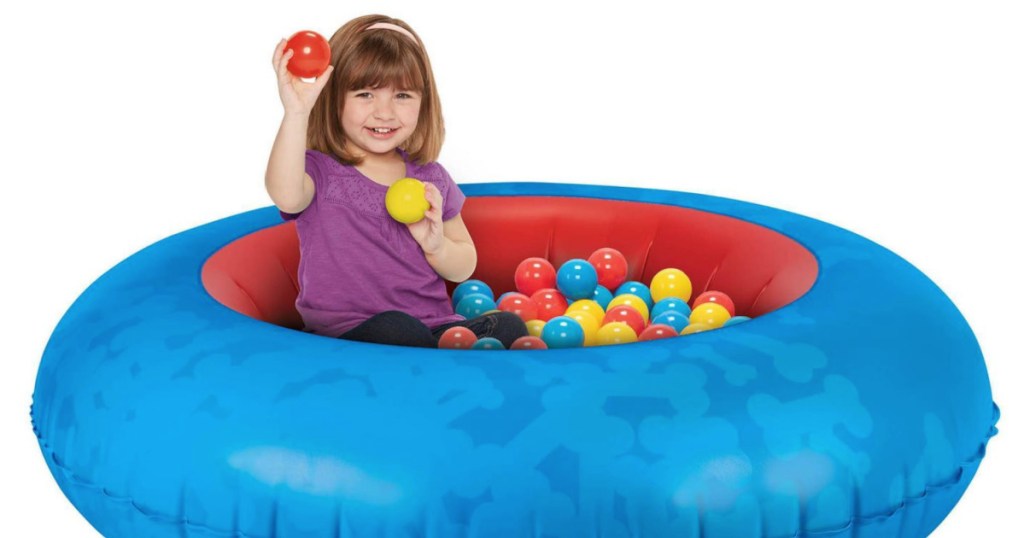girl in blue ball pit 