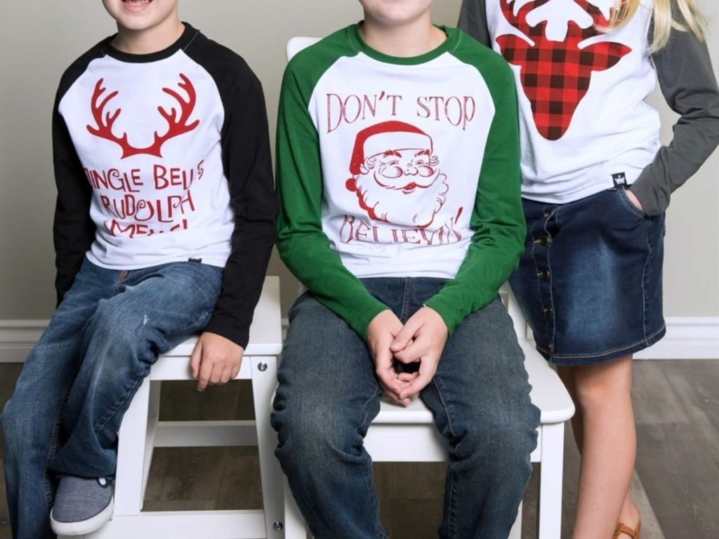 kids wearing Christmas grahic tees