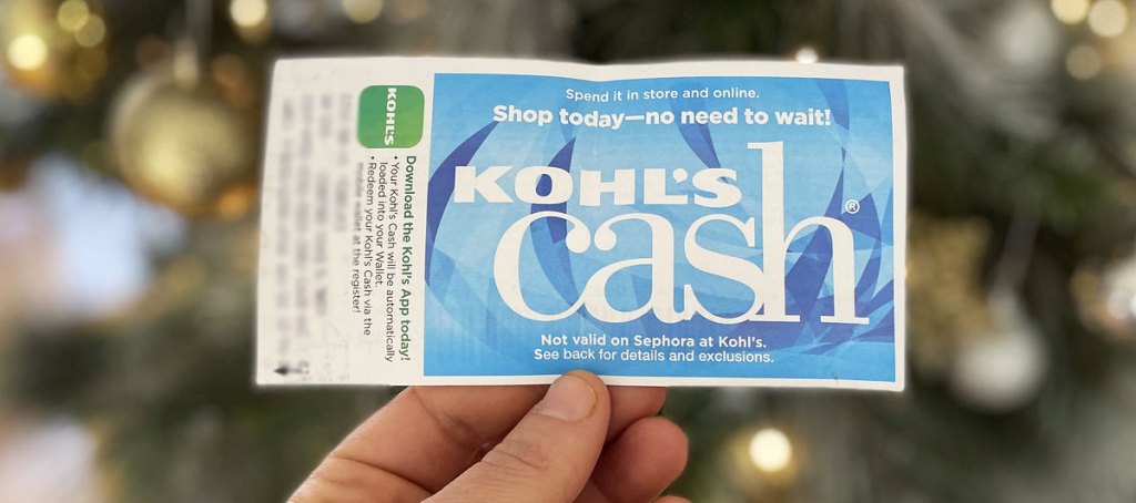 hand holding up kohl's cash