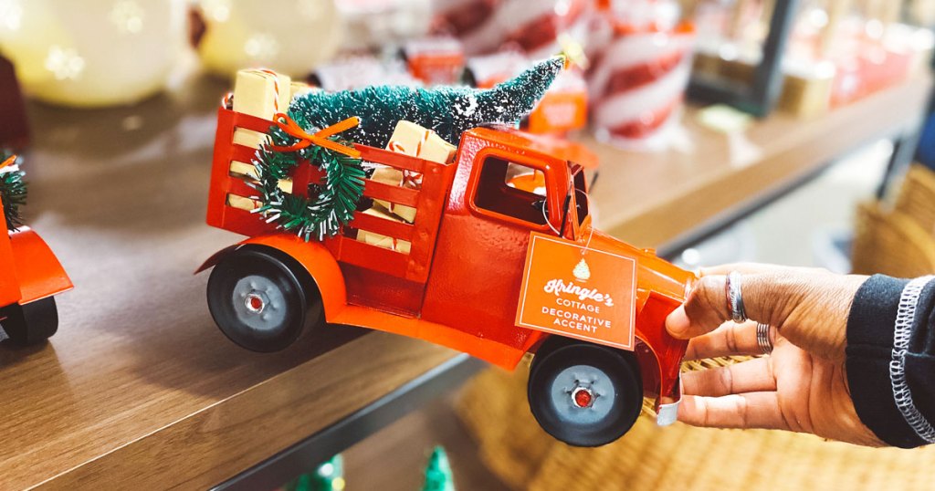 holding red truck decor at kohls