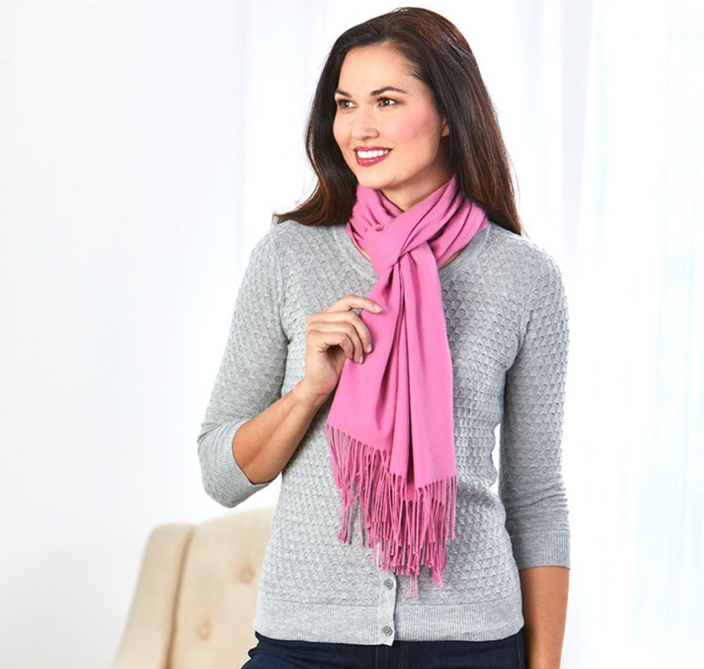 woman wearing a pink scarf