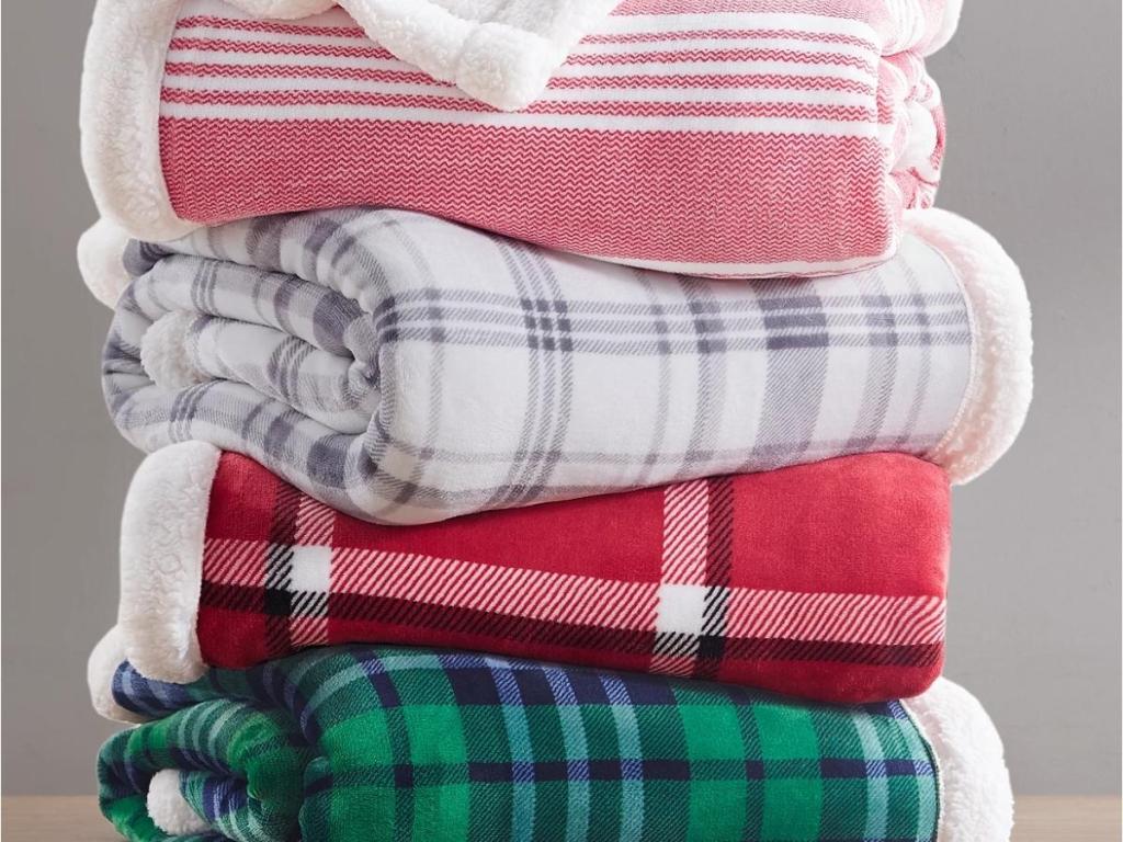 martha stewart sherpa throw blankets folded and stacked
