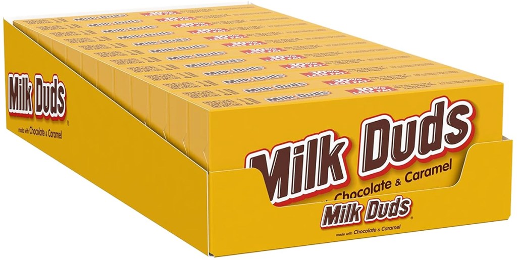 case of yellow boxes of Milk Duds candies