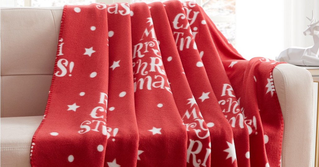 red and white Christmas throw blanket draped over couch